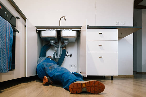 Professional Drain Cleaning technician working in Farmville, VA